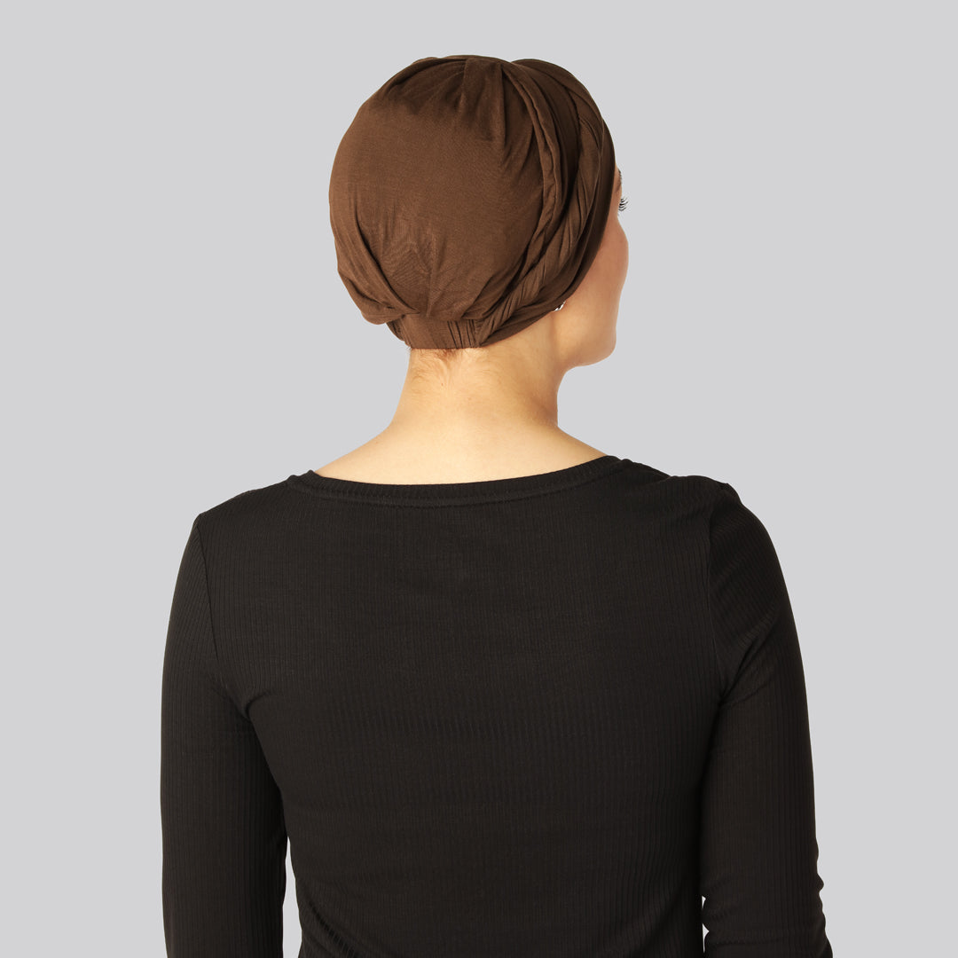 Brunt, vriden bambuturban för kvinnor