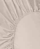 Bambu-dra-på-lakan i beige