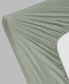 Dra-på-lakan i bambu i olivgrönt