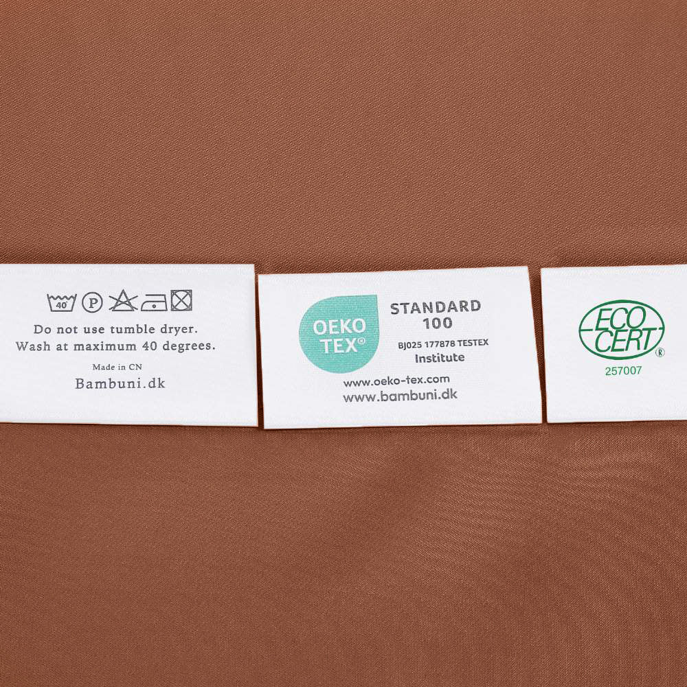 Bambusängkläder i bränt orange från Bambuni